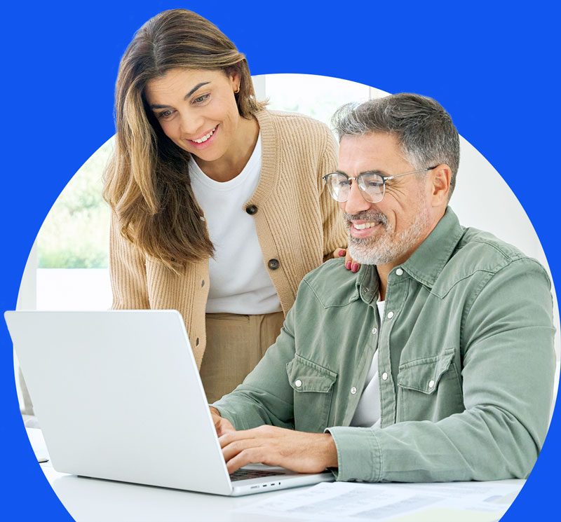 Couple Looking at a Laptop